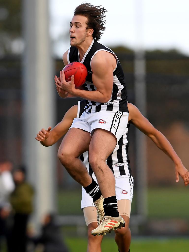 Essendon District: Moonee Valley’&#149;s Zac Di Giuseppe takes an uncontested mark against Coburg Districts. Picture: Andy Brownbill