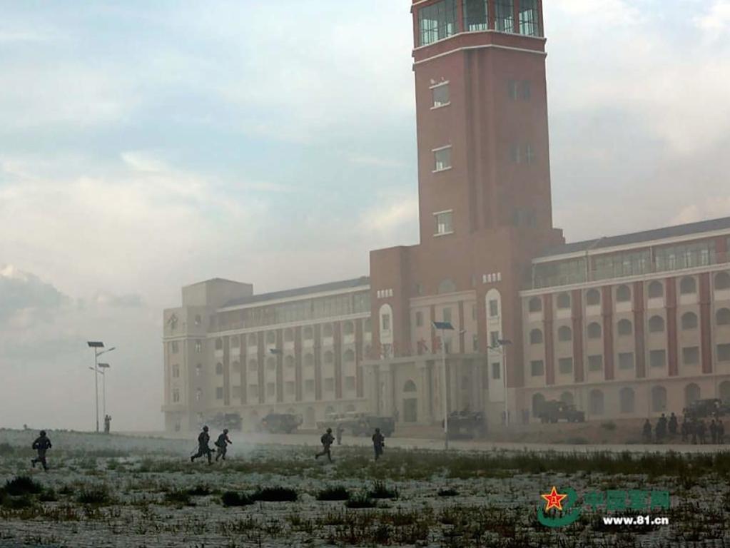 A screenshot of vision showing a mock invasion of a replica of Taiwan's presidential headquarters.