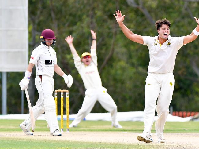 Premier cricket First grade final between Ipswich and Wests. West bowler, Blake Edwards and Ipswich batsman, Bryn Llewellyn (red). Picture: Patrick Woods.