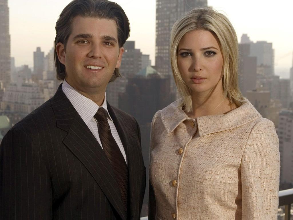 Donald Trump Jr. and his sister Ivanka Trump pose for a photo on the penthouse terrace of the Trump Park Avenue building in New York 11/04/06.