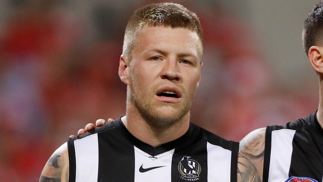 SYDNEY, AUSTRALIA - SEPTEMBER 17: Jordan De Goey and Jeremy Howe of the Magpies look dejected after a loss during the 2022 AFL Second Preliminary Final match between the Sydney Swans and the Collingwood Magpies at the Sydney Cricket Ground on September 17, 2022 in Sydney, Australia. (Photo by Dylan Burns/AFL Photos via Getty Images)