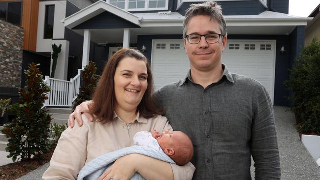 Rod and Gemma Walker with their son, Harrison, at their home in Chelmer. Picture: Liam Kidston.