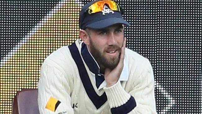 Victoria’s Glenn Maxwell finds himself on the sideline after being named 12th man for the Sheffield Shield match between Victoria and Tasmania at the MCG in October. Picture: Getty Images