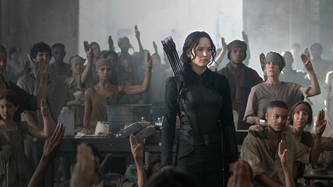 Katniss (Jennifer Lawrence) standing amongst her supporters. Picture: Supplied