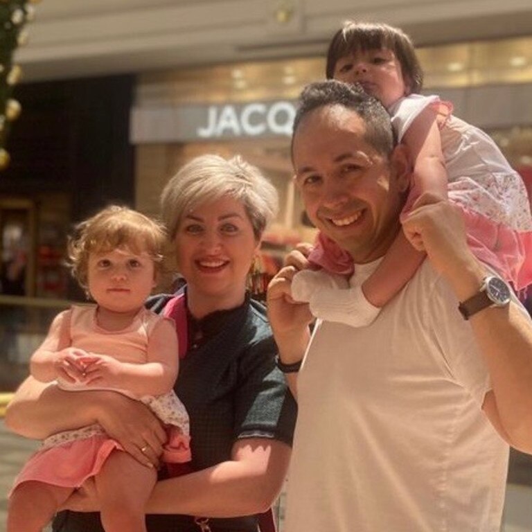 Hami Niroumand and his wife Afrooz with their twin daughters.