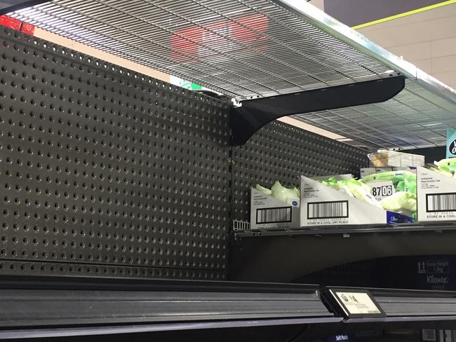 Empty shelves and labels showing tissues are in short supply at Coles and Woolworths. Supplied