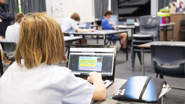 All students at Redcliffe State High School are learning via online platforms during COVID-19. PHOTO: AAP /Attila Csaszar