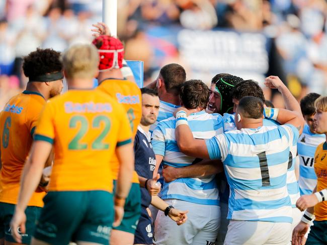 Argentina's Los Pumas flanker Pablo Matera (Covered) celebrates with his teammates after scoring a try during the Rugby Championship match between Argentina and Australia at Brigadier General Estanislao Lopez Stadium in Santa Fe, Argentina on September 7, 2024. (Photo by GERONIMO URANGA / AFP)