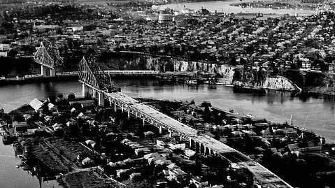 An aerial view of the Story Bridge in 1935 during construction. The bridge was built by the State Government as a toll bridge and then transferred to Brisbane City Council seven years later