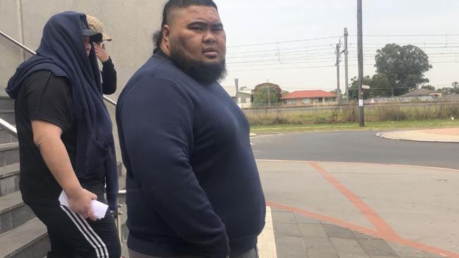 Benjamin Falefoou, 21, leaves Mt Druitt Local Court after pleading guilty to leading a brawl at a Pacific Islander football match.