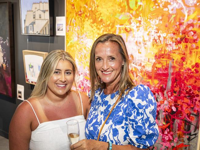 Paris Carreira (left) with finalist Belinda Nadwie with her work Bush Tucker at The Toowoomba Gallery for The Next Big Thing art prize and exhibition, Friday, March 1, 2024. Picture: Kevin Farmer