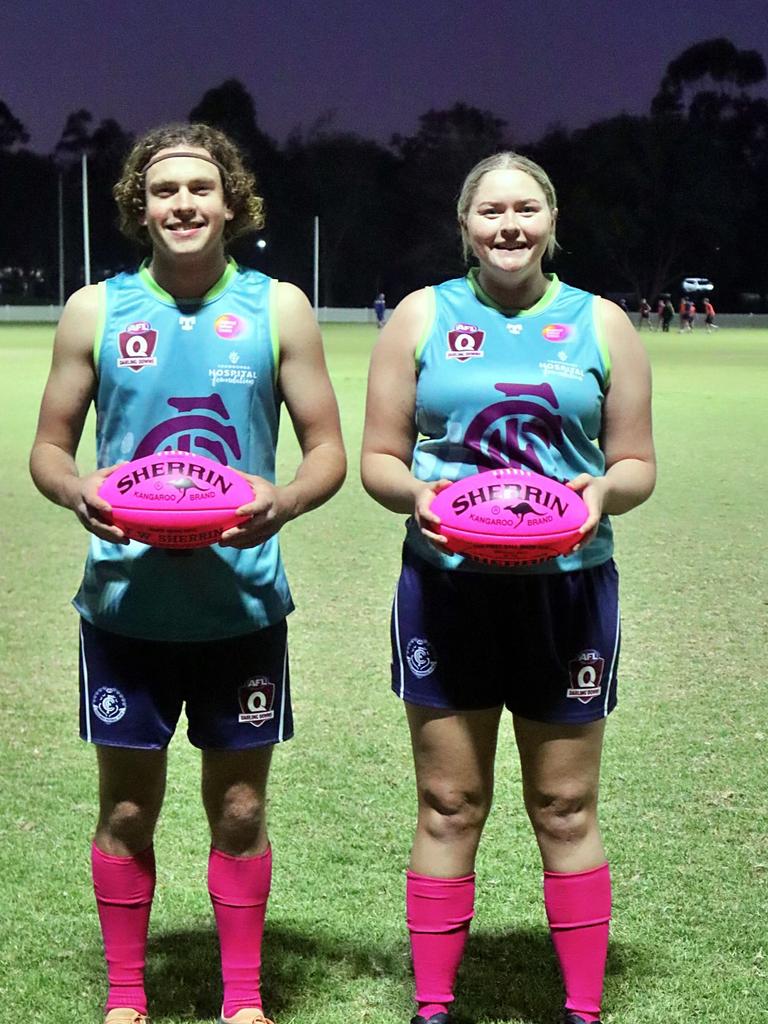 Coolaroo men's captain Henry Sheath and women's captain Ada McKenzie in the one-off Coolaroo Kick for Cancer guernseys.