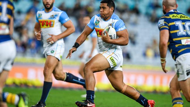 The emergence of players including Moeaki Fotuaika (centre) has been a huge bonus for the Titans this season. Photo: AAP