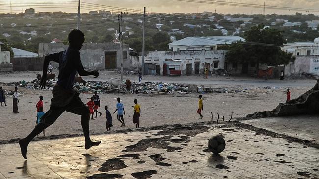 Somali children play soccer on a bulidling's upper floor in Mogadishu. Picture: AFP