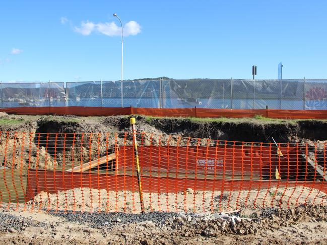 The roadside location where construction workers will drill under the highway to Brisbane Water.