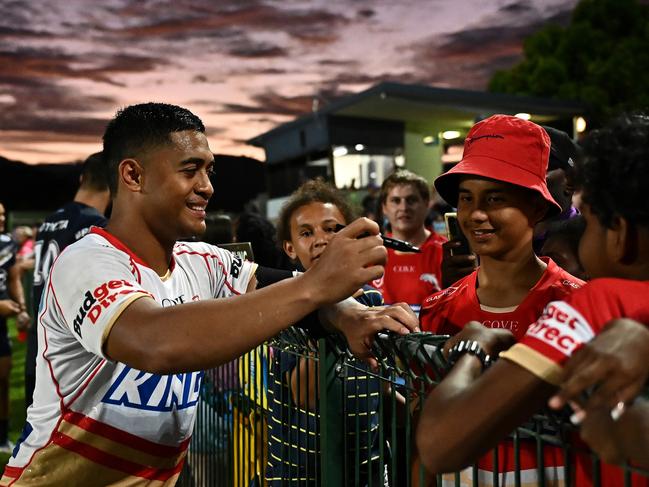 CAIRNS, AUSTRALIA - FEBRUARY 12: Anthony Milford of the Dolphins with fans after the during the NRL Trial Match between North Queensland Cowboys and Dolphins at Barlow Park on February 12, 2023 in Cairns, Australia. (Photo by Emily Barker/Getty Images)