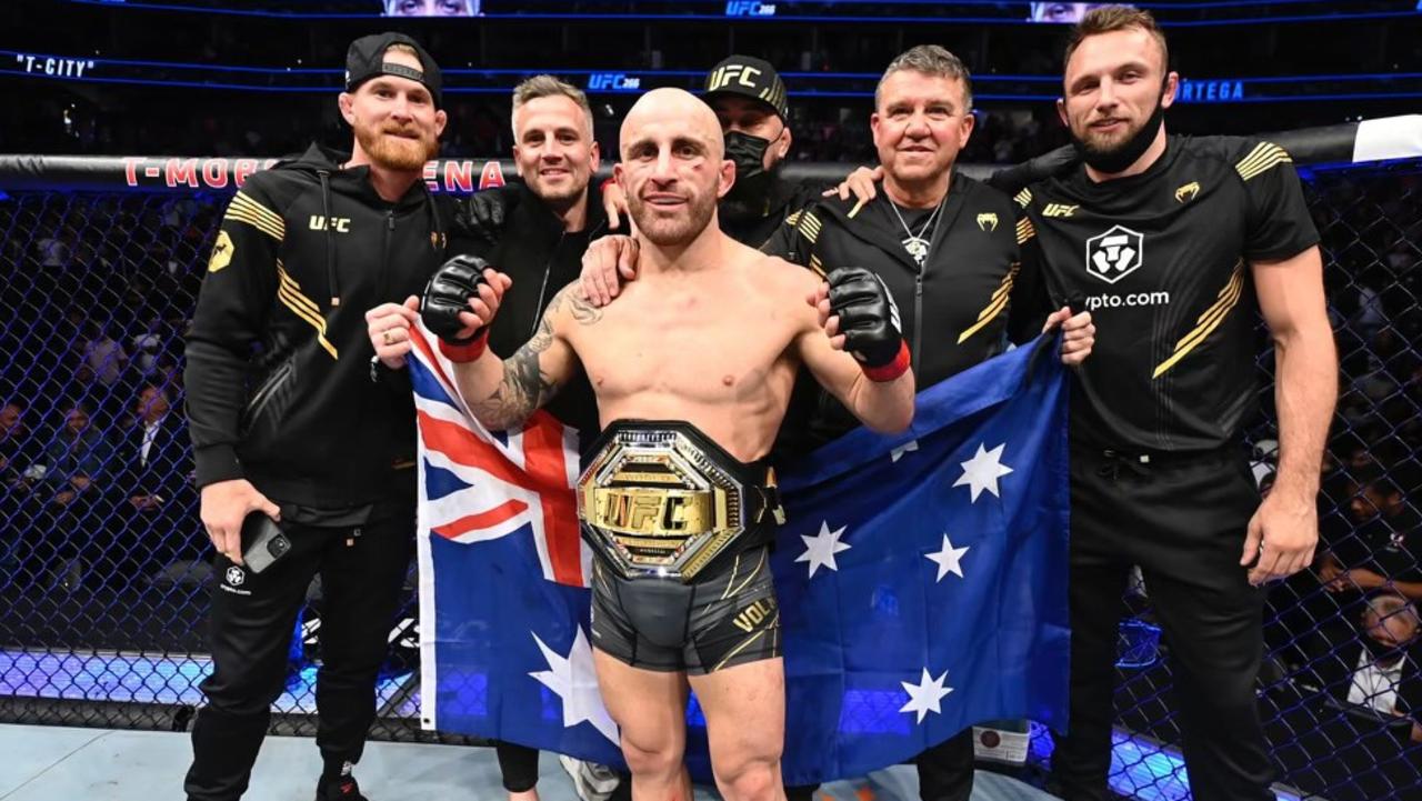 Volkanovski celebrates after defending his featherweight title against Brian Ortega.