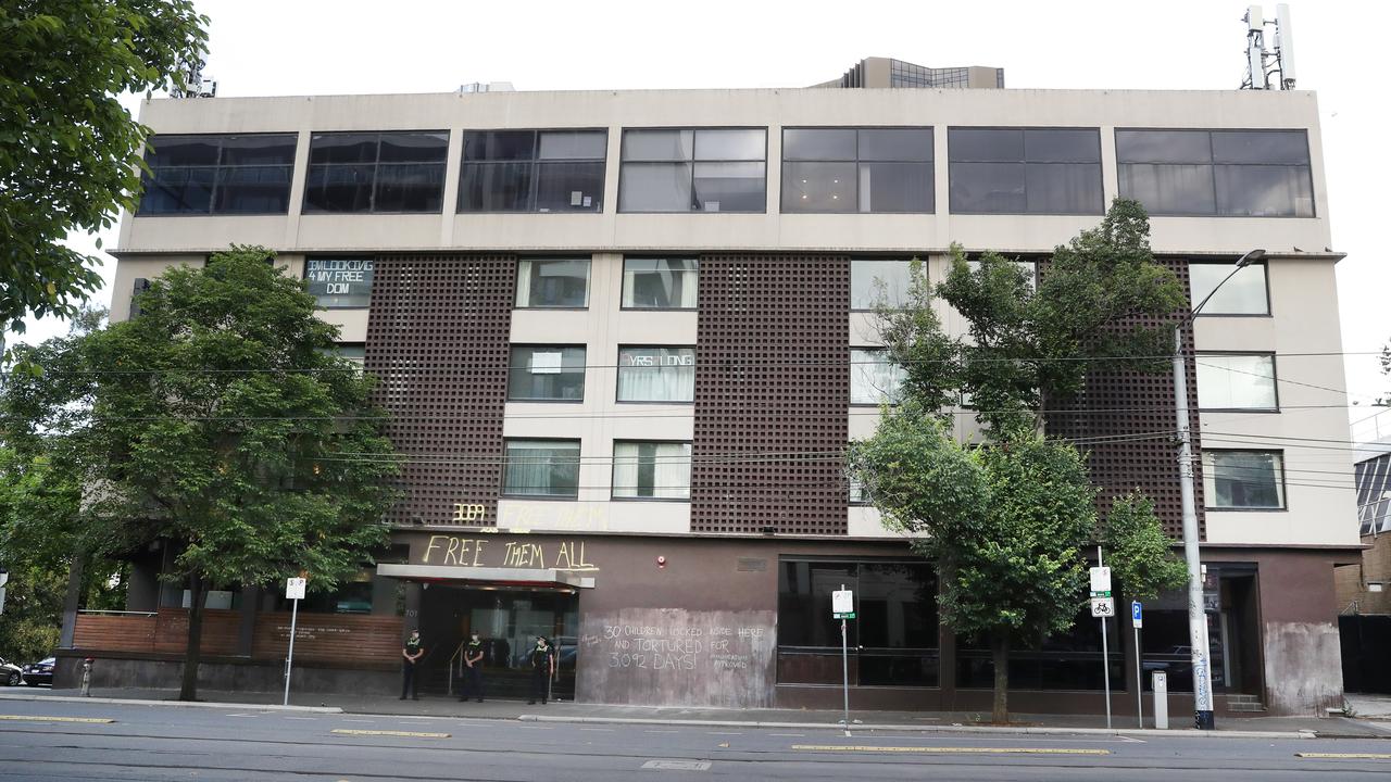 Police keep watch on a Hotel in Carlton where Novak Djokovic is being held. Picture: David Crosling