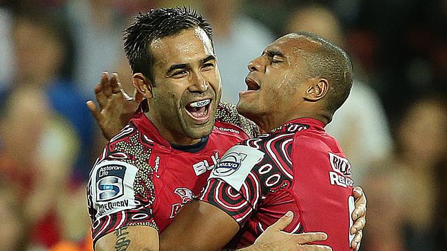 Qld Reds vs The Highlanders, at Suncorp Stadium. Rod Davies and Will Genia celebrate a second half try. Pic Jono Searle