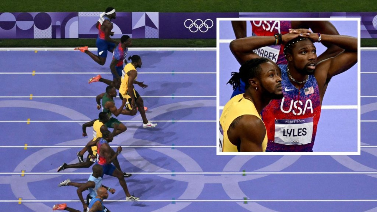 There was an excruciating wait to find out the winner of the 100m final. Pictures: Getty