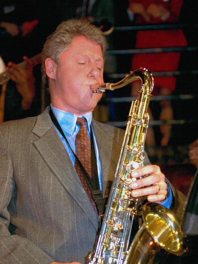 Then Democratic Presidential Candidate Bill Clinton playing the saxophone at a fundraiser at a Washington club, January 1992, just before the Iowa caucuses.