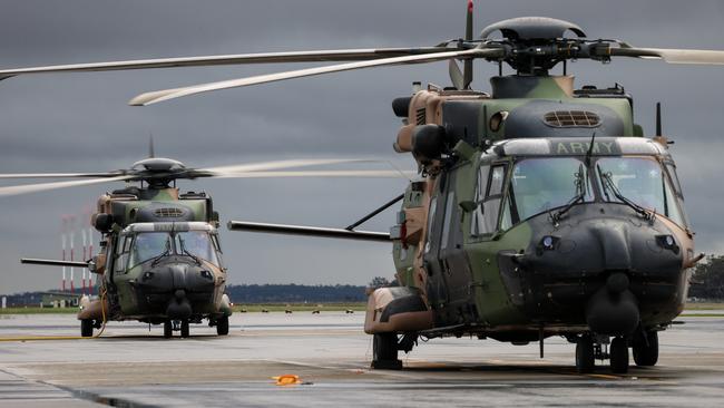 Australian Defence Force MRH-90 Taipan helicopters from the Army Aviation Training Centre at Oakey in Queensland prepare to takeoff. Picture: Bradley Richardson