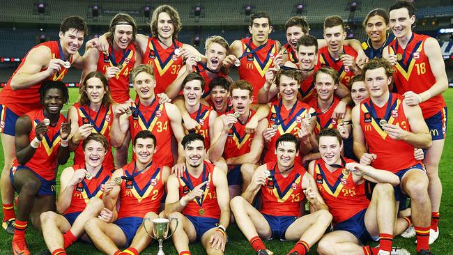 MELBOURNE, AUSTRALIA - JULY 04:  South Australia players celebrate the win during the U18 AFL Championship match between Vic Metro and South Australia at Etihad Stadium on July 4, 2018 in Melbourne, Australia.  (Photo by Michael Dodge/Getty Images)