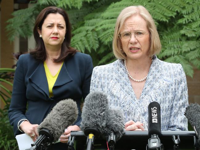 Premier Annastacia Palaszczuk listens to chief health officer Janette Young during a press conference. Picture: Peter Wallis