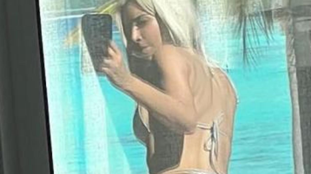 Kim Kardashian shows off her bum in cheeky selfie