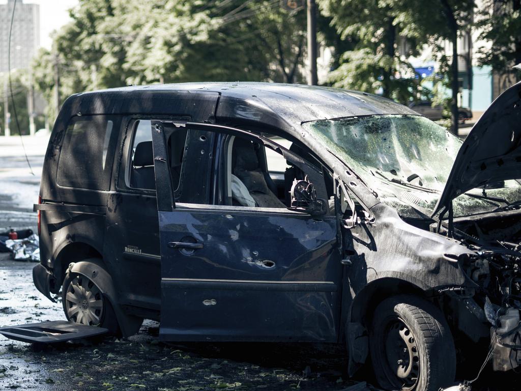 People and rescuers gather at the scene following a Russian strike on Sumy. Picture: AP/Yehor Kryvoruchko, Kordon Media
