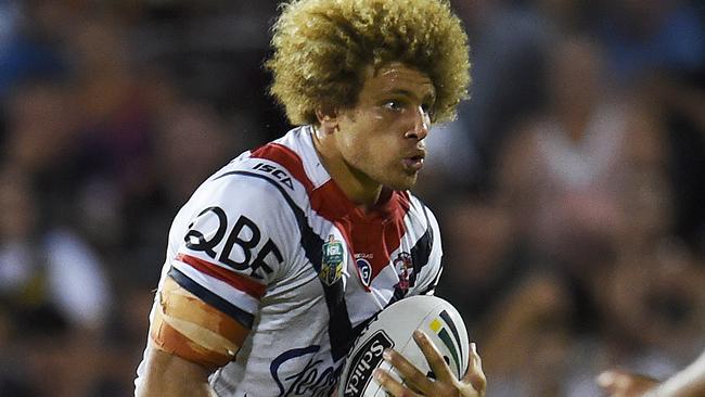 Eloni Vunakece charges into the Cowboys defence Picture: Zak Simmonds