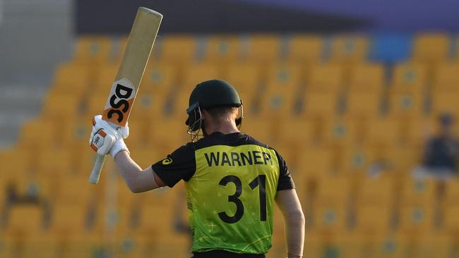 David Warner celebrates scoring a half-century against the West Indies. Picture: Indranil Mukherjee / AFP