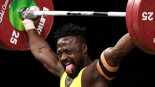 Francois Etoundi lifts on his way to winning a bronze medal on April 7. Picture: AFP/William West