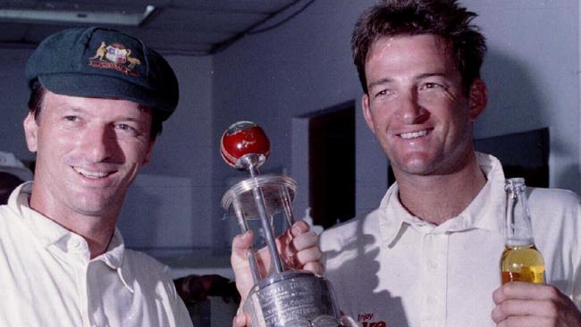 Steve and Mark Waugh hold the Sir Frank Worrell trophy after Australia sealed the series in Kingston.