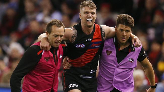 Jake Stringer had to be helped from the field and did not return against the Hawks. Picture: Michael Klein