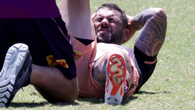 Adam Reynolds, being worked on by the trainer, Broncos are training in the heat, Redhill, on Monday 22nd January 2024 - Photo Steve Pohlner