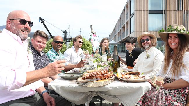 GOOD LIFE: Nick Haddow, left, enjoys Tasmanian produce on the Hobart waterfront. Picture: SAM ROSEWARNE