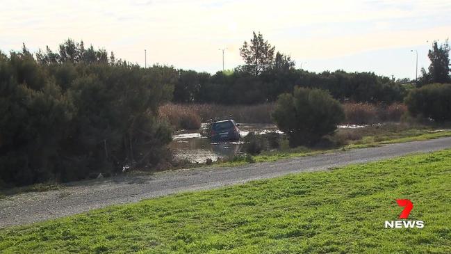 The car ended up in a lagoon at Dry Creek. Picture: 7NEWS Adelaide