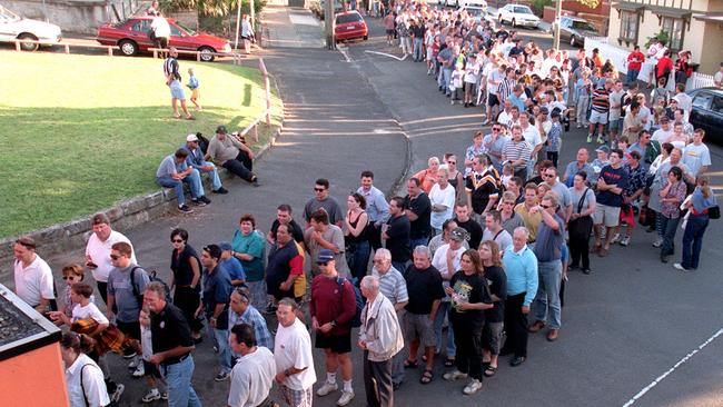 Fans queue down the road outside Leichhardt Oval for the Tigers v Northern Eagles trial game in January 2000, where Newcastle players hid from Warren Ryan.