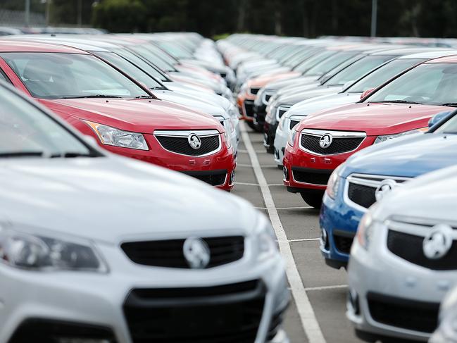 UPLOADED IMAGE - ADELAIDE, AUSTRALIA - JULY 30: New cars are parked on the lot at the Holden manufacturing plant at Elizabeth on July 30, 2013 in Adelaide, Australia. Holden, a subsidiary of American car giant General Motors recently reduced its staff in Adelaide by 400, in an effort to reduce operating costs. Holden and other local car manufacturers have received years of both federal and state government grants, and PM Kevin Rudd recently said he was "...determined to see this industry survive into the future." (Photo by Morne de Klerk/Getty Images)