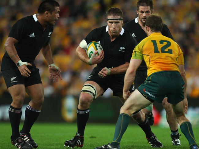 BRISBANE, AUSTRALIA - AUGUST 27: Brad Thorn of the All Blacks is tackeld by Pat McCabe of the Wallabies during the Tri-Nations Bledisloe Cup match between the Australian Wallabies and the New Zealand All Blacks at Suncorp Stadium on August 27, 2011 in Brisbane, Australia. (Photo by Phil Walter/Getty Images)