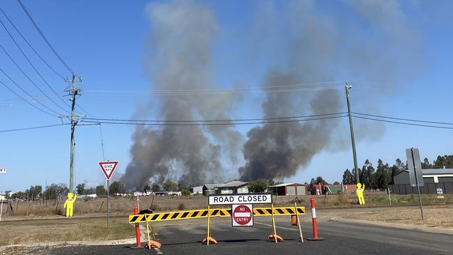 A large grass fire was threatening homes on the eastern side of Dalby, near the intersection of the Warrego Highway and Dalby-Cecil Plains Road.