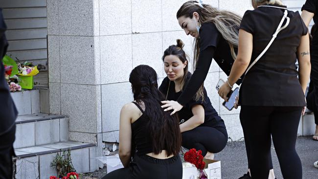 Family and friends hold a vigil for the gangland murder of stand over man Amar Kettule at Downey Lane Fairfield on January 11. Picture: Adam Yip