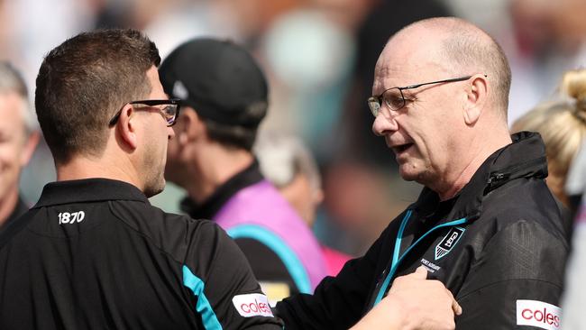 A succession plan between Ken Hinkley and Josh Carr is nearing reality. Picture: Sarah Reed/AFL Photos via Getty Images