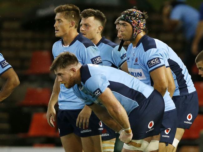 The defeated  Waratahs side wait for a Blues conversion  during the Round 2 Super Rugby match between the New South Wales Waratahs and the Auckland Blues at McDonald Jones Stadium in Newcastle, Saturday, February 8, 2020. (AAP Image/Darren Pateman) NO ARCHIVING, EDITORIAL USE ONLY