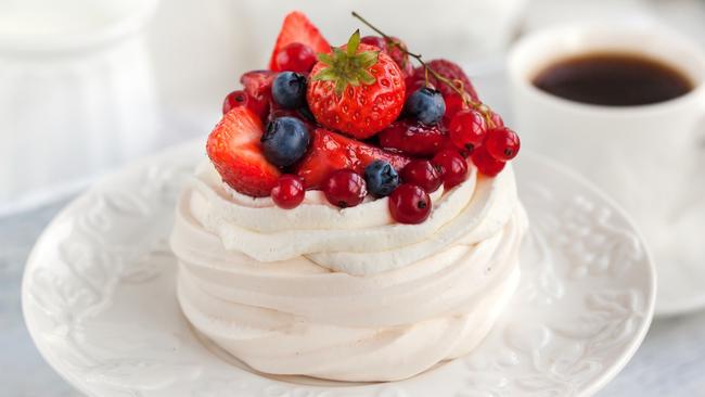 Pavlova with fresh berries is a Christmas staple.