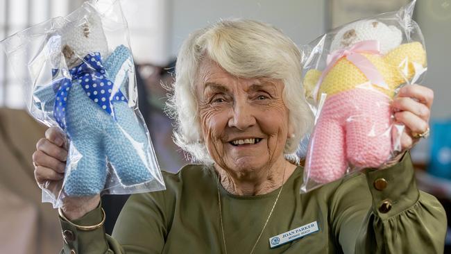 Joan Parker holding up teddy's she's made. Picture: Jerad Williams