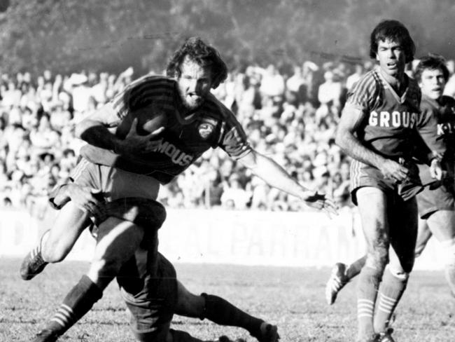 Parramatta’s Ray Price is tackled by Bob McMillan as John Peard looks on during Parramatta versus Souths at Cumberland Oval, Parramatta in 1978.