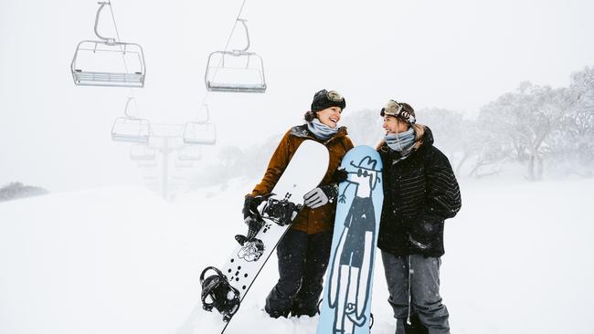 With Sydney locked down, snowboarders Siobhan Anton, 22, and Ellie McMaster, 19, from Newcastle, have the Perisher slopes all to themselves. Picture: Jamila Toderas