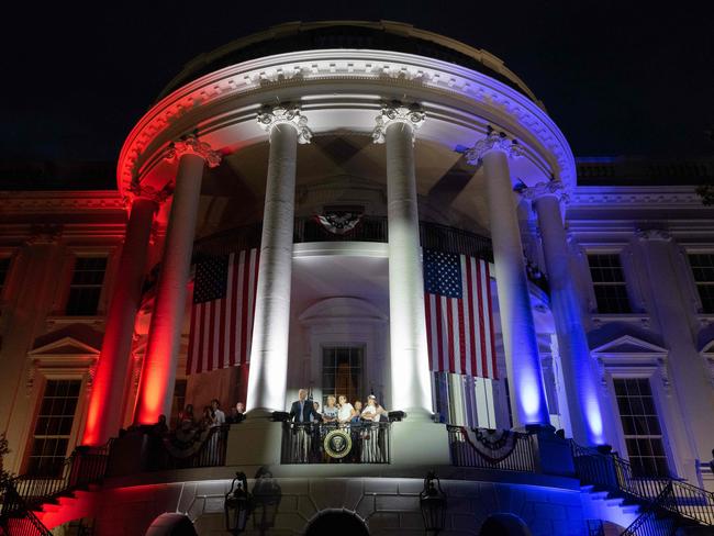 US President Joe Biden, US First Lady Jill Biden and members of their family, watch the Independence Day fireworks display from the Truman Balcony of the White House. Picture: AFP